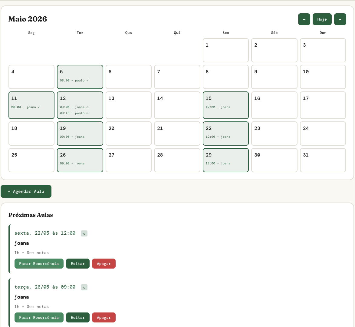 Monthly calendar with scheduled classes and attendance indicators